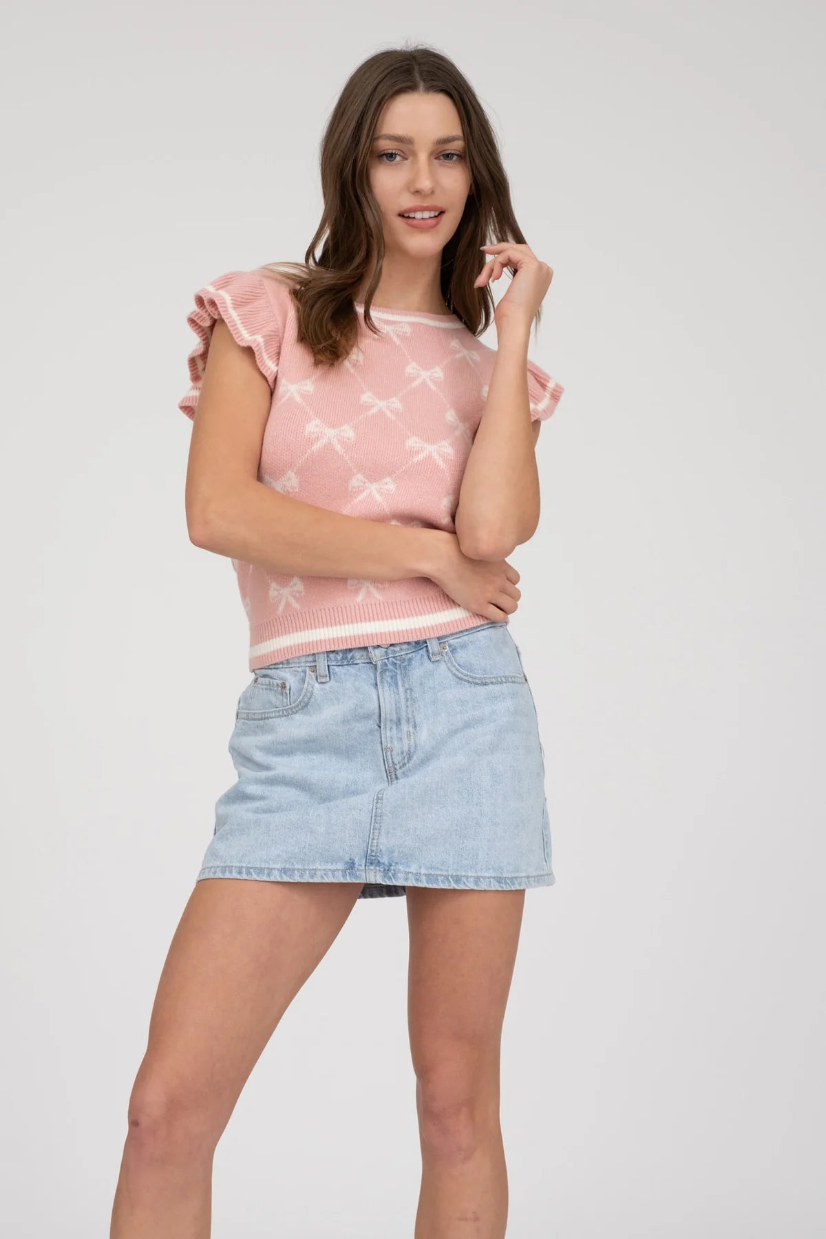 BOW PATTERN RUFFLE SWEATER